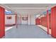 Wide carport featuring white ceilings and bright red support beams providing secure parking at 2016 Linden Ave, Las Vegas, NV 89101