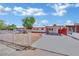Charming single-story home featuring a carport, fresh exterior paint, and a secure gated front yard at 2016 Linden Ave, Las Vegas, NV 89101