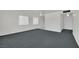 Open floorplan with gray carpet, and white walls and trim at 2016 Linden Ave, Las Vegas, NV 89101