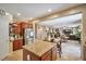 Well-appointed kitchen with a large island, stainless steel fridge, and access to the living areas at 2189 De Narvik Dr, Henderson, NV 89044