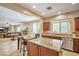 Bright kitchen featuring granite counters, stainless steel appliances, and ample cabinet space at 2189 De Narvik Dr, Henderson, NV 89044