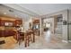 Open kitchen with tile floors, dark wood cabinetry, and stainless steel appliances at 2189 De Narvik Dr, Henderson, NV 89044