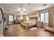 Expansive main bedroom offering natural light, ceiling fan, and ample space for relaxation at 2189 De Narvik Dr, Henderson, NV 89044