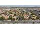 Expansive aerial view of a residential community surrounded by lush landscaping at 2300 E Silverado Ranch Blvd # 1165, Las Vegas, NV 89183