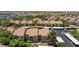 Aerial view showcases well-maintained residential buildings with ample parking and landscaping at 2300 E Silverado Ranch Blvd # 1165, Las Vegas, NV 89183