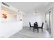 Bright dining area with a modern table and chairs, perfect for entertaining guests at 2300 E Silverado Ranch Blvd # 1165, Las Vegas, NV 89183