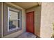 A welcoming front door provides curb appeal and natural light through the window at 2300 E Silverado Ranch Blvd # 1165, Las Vegas, NV 89183