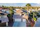Inviting two-story home boasting a well-manicured lawn, brick accents, and a spacious two-car garage at 2639 Regency Cove Ct, Las Vegas, NV 89121