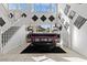 Bright living area featuring a stylish piano, modern decor, and ample natural light at 2639 Regency Cove Ct, Las Vegas, NV 89121