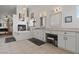 Elegant main bathroom featuring a soaking tub, fireplace, and ample counter space at 2639 Regency Cove Ct, Las Vegas, NV 89121