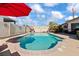 Sparkling in-ground pool with a pool-side spa and outdoor seating for entertainment and relaxation at 2639 Regency Cove Ct, Las Vegas, NV 89121