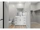 Modern bathroom features a white vanity, chrome fixtures, and glass enclosed shower at 3232 Lahontan St, North Las Vegas, NV 89032