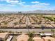 Expansive aerial view of a residential neighborhood with mountain views and clear blue skies above at 350 S Durango Dr # 108, Las Vegas, NV 89145