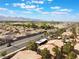 A beautiful aerial view showing the residential neighborhood, landscaping, and roadways at 350 S Durango Dr # 108, Las Vegas, NV 89145