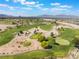 Panoramic aerial view of the green golf course and surrounding desert landscape at 350 S Durango Dr # 108, Las Vegas, NV 89145