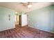Bedroom featuring neutral walls, carpet, a ceiling fan, and a closet at 350 S Durango Dr # 108, Las Vegas, NV 89145