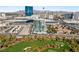 View of luxury highrise condo building surrounded by golf course, landscaping and the Las Vegas skyline at 360 E Desert Inn Rd # 1901, Las Vegas, NV 89109