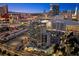 Exterior night view of a luxury condo highrise with views of the Las Vegas skyline at 360 E Desert Inn Rd # 1901, Las Vegas, NV 89109