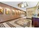 Spacious hallway with decorative marble floors, textured walls, and elegant lighting enhance the entrance at 360 E Desert Inn Rd # 1901, Las Vegas, NV 89109