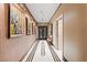 Elegant hallway with marble floors and recessed lighting showcases the home's sophisticated design at 360 E Desert Inn Rd # 1901, Las Vegas, NV 89109