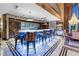 Modern open-concept kitchen featuring a breakfast bar with city views at 360 E Desert Inn Rd # 1901, Las Vegas, NV 89109
