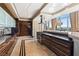Modern kitchen features stainless steel appliances, wood cabinets, and spacious countertops at 360 E Desert Inn Rd # 1901, Las Vegas, NV 89109