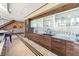 Bright kitchen featuring modern cabinetry, sleek countertops, tile backsplash, and ample storage space at 360 E Desert Inn Rd # 1901, Las Vegas, NV 89109