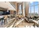 Spacious living and dining area with high ceilings, elegant decor, and panoramic city views at 360 E Desert Inn Rd # 1901, Las Vegas, NV 89109
