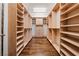 Organized walk-in closet with custom shelving and ample storage, provides functional space at 360 E Desert Inn Rd # 1901, Las Vegas, NV 89109