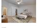 Cozy bedroom with a comfortable bed, stylish decor, and ample space, perfect for relaxation and rest at 3832 Alder Creek Ct, North Las Vegas, NV 89032