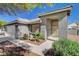 Charming single-story home with a well-manicured lawn, inviting entryway, and attached two-car garage at 3832 Alder Creek Ct, North Las Vegas, NV 89032
