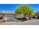 Inviting single-Gathering home with a spacious driveway, mature landscaping, and a well-maintained front yard at 3832 Alder Creek Ct, North Las Vegas, NV 89032