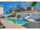 Backyard pool with water slide and painted block wall offers hours of fun in the sun at 3832 Alder Creek Ct, North Las Vegas, NV 89032