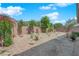 Low-maintenance backyard featuring desert landscaping and a gravel ground cover at 40 Vicolo Della Luna, Henderson, NV 89011