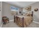 Cozy bedroom with warm tones, a comfortable bed, and an inviting sitting area at 40 Vicolo Della Luna, Henderson, NV 89011