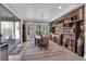 Elegant dining room with seating for six and a view of the backyard at 40 Vicolo Della Luna, Henderson, NV 89011