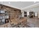 This spacious dining room is open to the kitchen and has a wood accent wall at 40 Vicolo Della Luna, Henderson, NV 89011