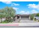 Inviting single-story home featuring manicured landscaping, a two-car garage, and a welcoming front entrance at 40 Vicolo Della Luna, Henderson, NV 89011