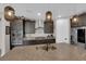 Well-appointed kitchen featuring a large island, built-in appliances, and seamless flow into the adjacent living areas at 40 Vicolo Della Luna, Henderson, NV 89011