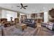 A well-lit living room featuring lots of seating and an open floor plan at 40 Vicolo Della Luna, Henderson, NV 89011