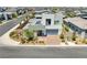 Aerial view of a modern home with manicured landscaping in a well-planned community at 4246 W Landberg Ave, Las Vegas, NV 89141