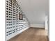 Cozy attic space with wood floors and stylish bone-patterned wallpaper at 4246 W Landberg Ave, Las Vegas, NV 89141