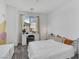 Cozy bedroom featuring neutral tones, ample natural light, and comfortable furnishings at 4246 W Landberg Ave, Las Vegas, NV 89141