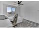 Inviting bedroom featuring a comfortable desk, natural light, and sleek furniture creates a modern feel at 4246 W Landberg Ave, Las Vegas, NV 89141
