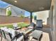 Outdoor patio with comfortable seating, a fire pit, grill and a landscaped yard at 4246 W Landberg Ave, Las Vegas, NV 89141