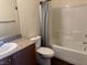 Bathroom boasts tub/shower combo, granite countertops, and ample lighting at 4554 Townwall St, Las Vegas, NV 89115