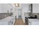 Bright kitchen with white cabinets, modern appliances, and a stylish backsplash, perfect for cooking at 4571 Sirius Ave, Las Vegas, NV 89102