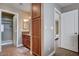 Bathroom with granite counters, tile flooring, and shower with glass door at 4860 Nara Vista Way # 204, Las Vegas, NV 89103