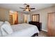 This bedroom has a ceiling fan, and views into the bathroom and hallway at 4860 Nara Vista Way # 204, Las Vegas, NV 89103
