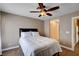 The bedroom features a ceiling fan, closet, and ensuite bathroom at 4860 Nara Vista Way # 204, Las Vegas, NV 89103